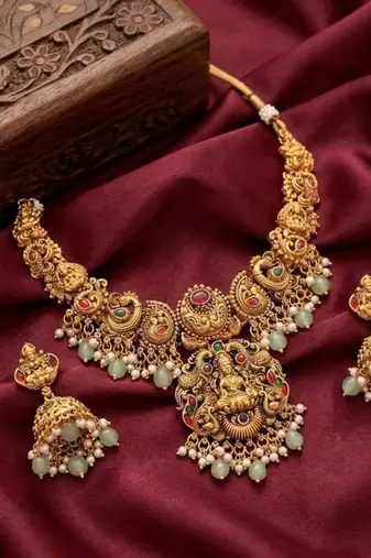 antique gold temple jewelry set: lakshmi necklace with jhumka earrings 