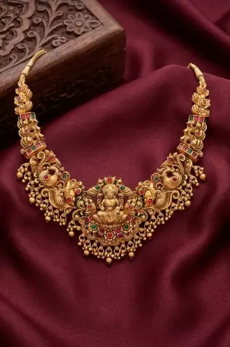 gold temple jewelry set with goddess lakshmi pendant & jhumkas