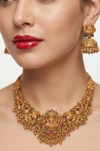 gold temple jewelry set with goddess lakshmi pendant & jhumkas