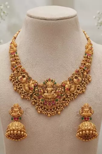 gold temple jewelry set with goddess lakshmi pendant & jhumkas