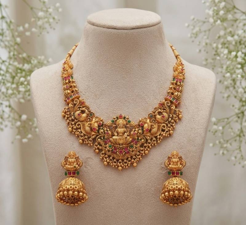 gold temple jewelry set with goddess lakshmi pendant & jhumkas
