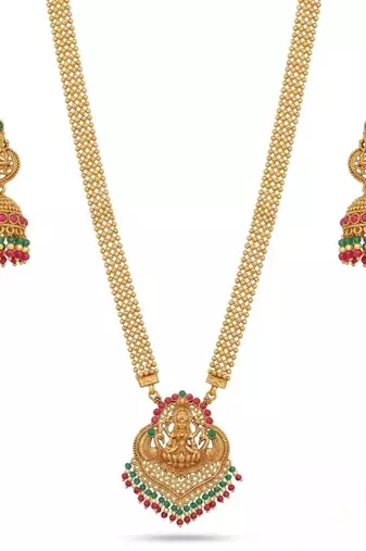 gold temple jewelry set with goddess lakshmi pendant, green & red beads & jhumkas 