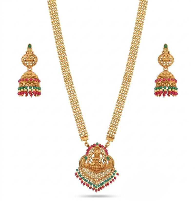 gold temple jewelry set with goddess lakshmi pendant, green & red beads & jhumkas 