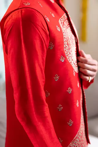 Red embroidered raw silk kurta and nehru jacket
