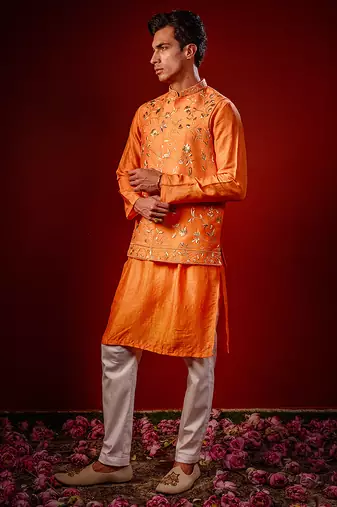 Orange embroidered raw silk kurta and nehru jacket