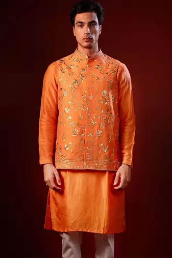 Orange embroidered raw silk kurta and nehru jacket