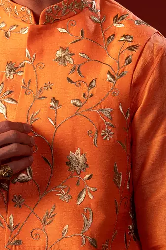 Orange embroidered raw silk kurta and nehru jacket