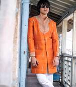Saffron orange embroidered raw silk sherwani set