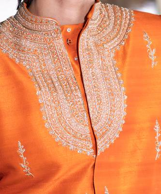 Saffron orange embroidered raw silk sherwani set 4