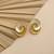 Anti tarnish spiral design stud earrings
