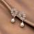 Silver toned korean cz drop earrings