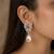 Silver toned korean cz drop earrings