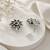 German silver white floral drop earrings