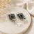 German silver black geometric drop earrings