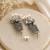 Silver oxidised elephant motif dangler earrings