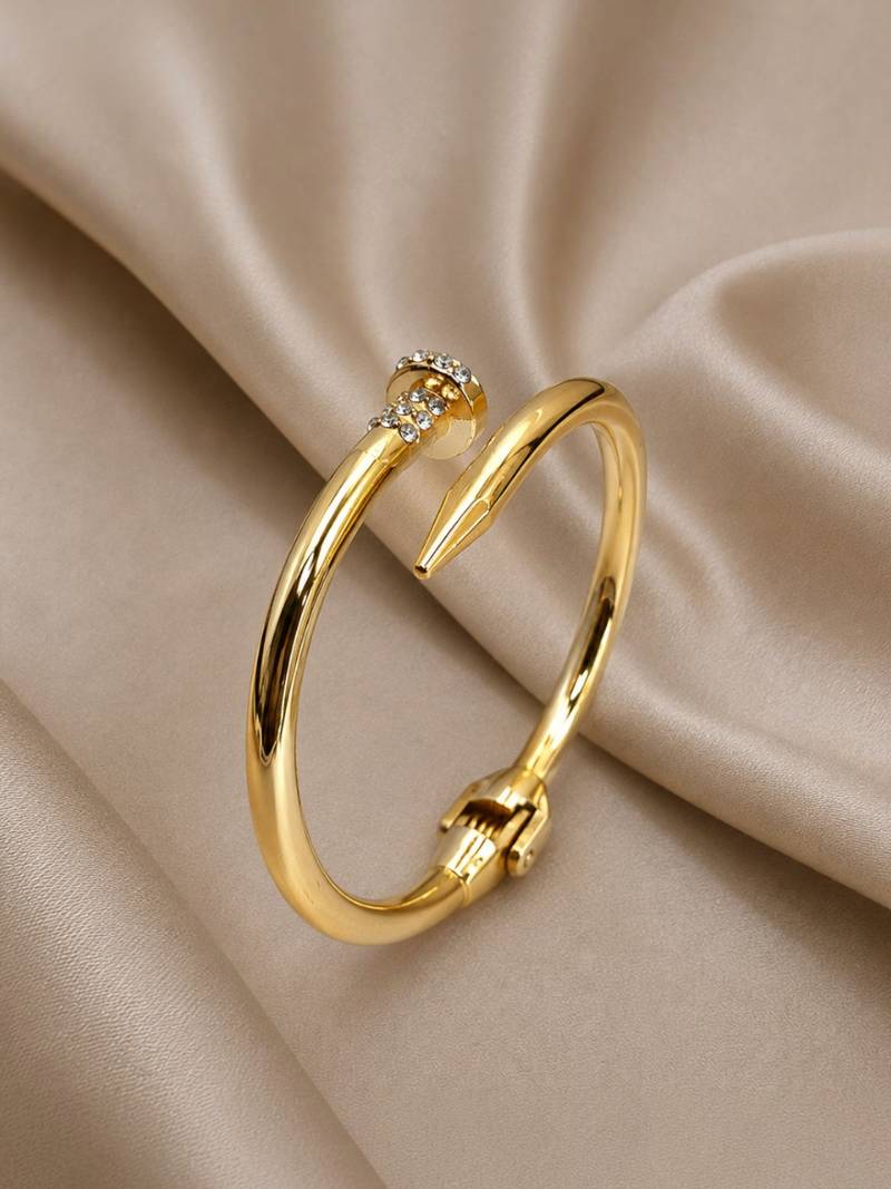 Anti tarnish gold tone nail cuff bracelet