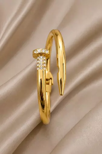 Anti tarnish gold tone nail cuff bracelet