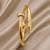 Anti tarnish gold tone nail cuff bracelet