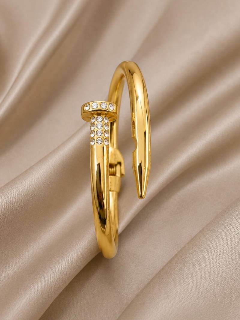 Anti tarnish gold tone nail cuff bracelet