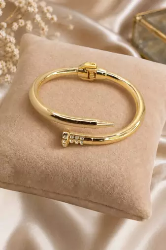 Anti tarnish gold tone nail cuff bracelet