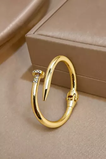 Anti tarnish gold tone nail cuff bracelet