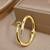 Anti tarnish gold tone nail cuff bracelet