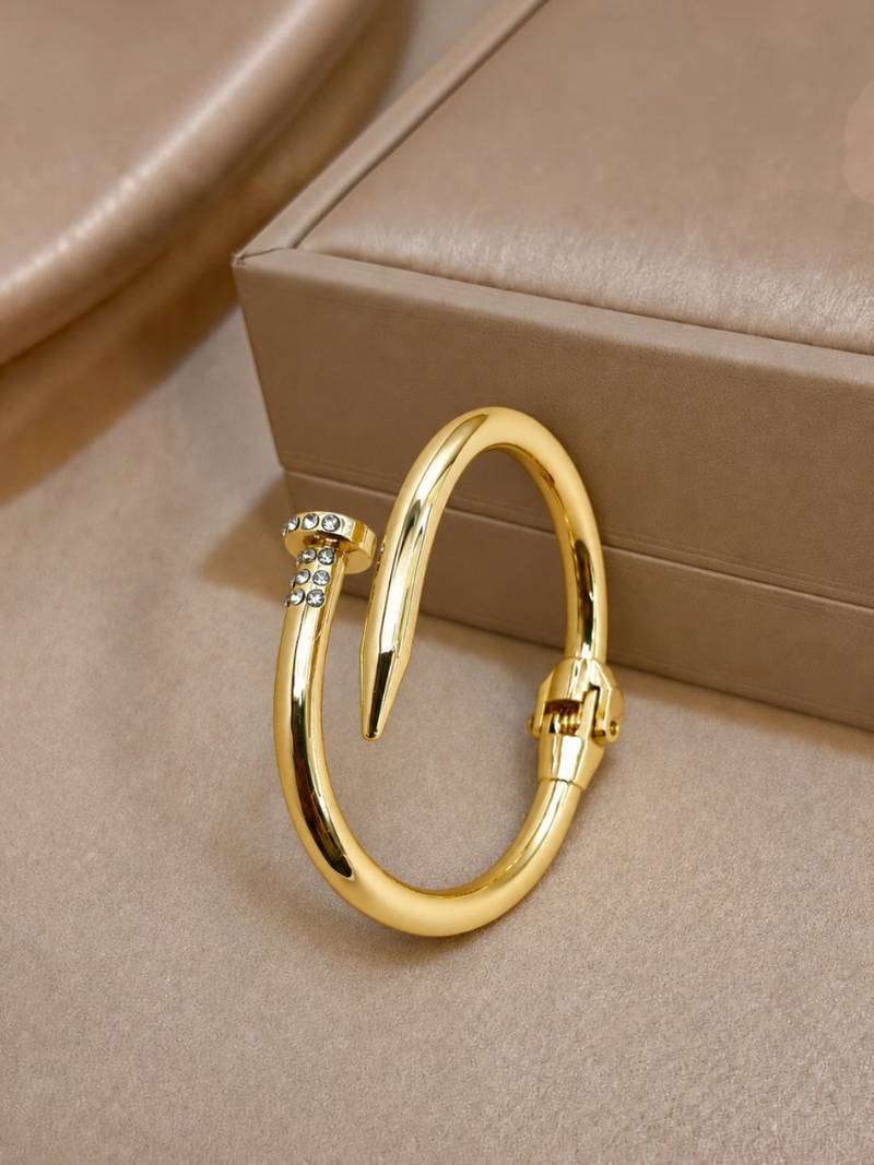Anti tarnish gold tone nail cuff bracelet