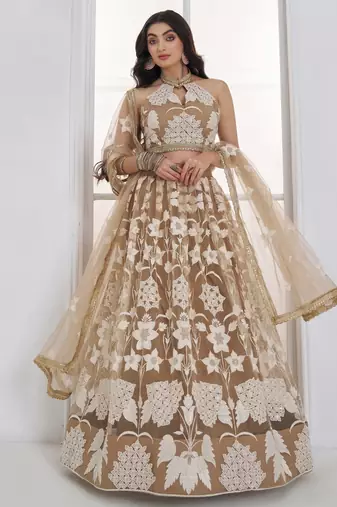Dazzling Beige Embroidered Net Marriage Wear Lehenga With Blouse