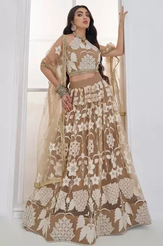 Dazzling Beige Embroidered Net Marriage Wear Lehenga With Blouse