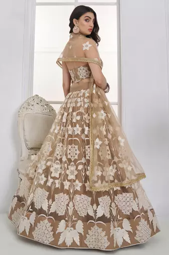 Dazzling Beige Embroidered Net Marriage Wear Lehenga With Blouse