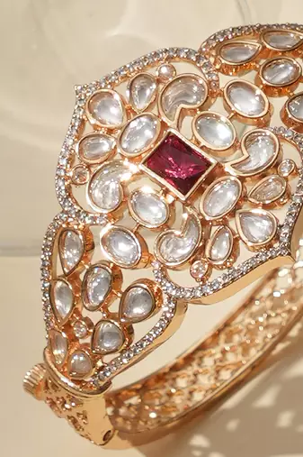 Gold plated ruby red kundan bracelet