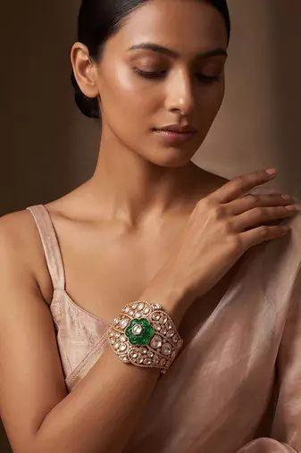 Gold plated royal green floral stone kundan bracelet