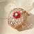 Gold plated red floral stone kundan bracelet