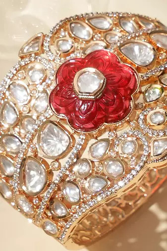 Gold plated red floral stone kundan bracelet