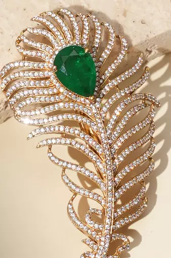 Gold plated green stone american diamond leaf brooch