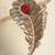 Gold plated red stone american diamond leaf brooch