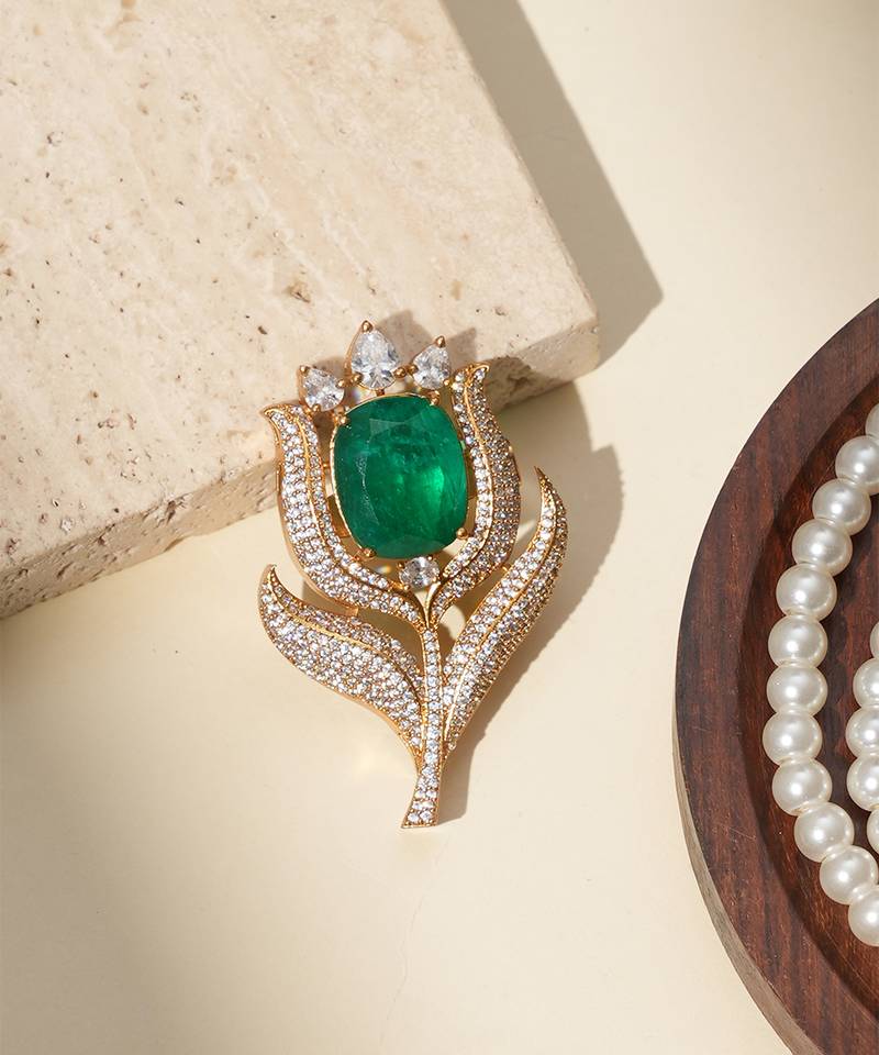 Gold plated green stone kundan rose motif brooch