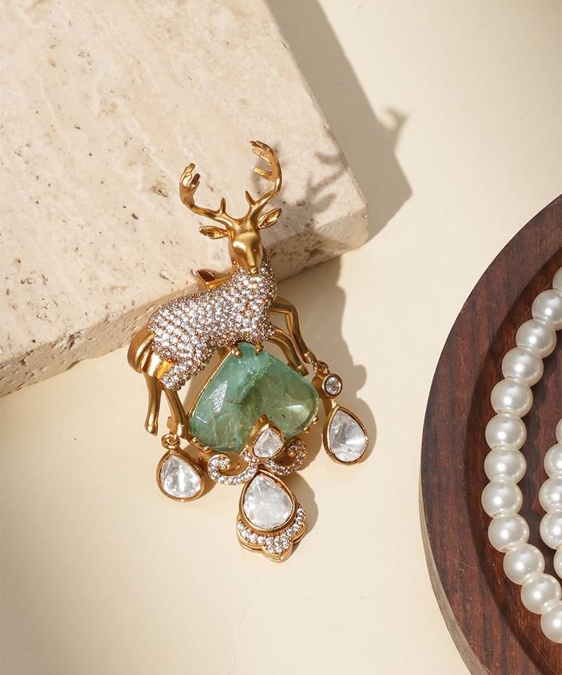 Gold plated mint green kundan deer motif brooch