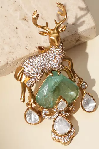 Gold plated mint green kundan deer motif brooch