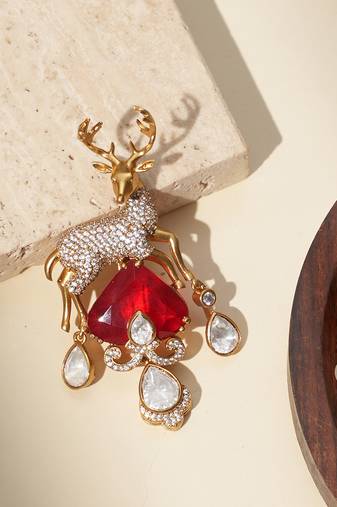 Gold plated ruby red kundan deer motif brooch