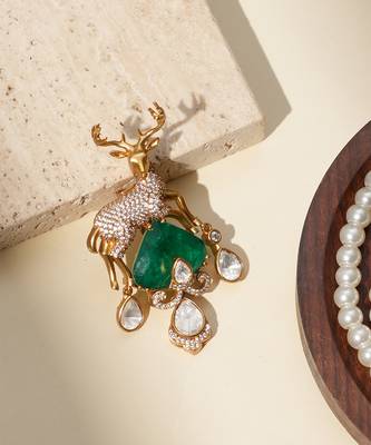 Gold plated green stone kundan dear motif brooch 1