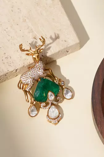 Gold plated green stone kundan dear motif brooch