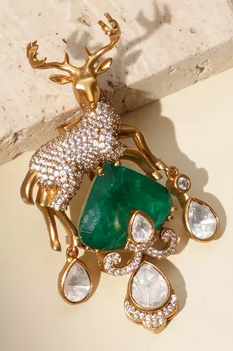 Gold plated green stone kundan dear motif brooch