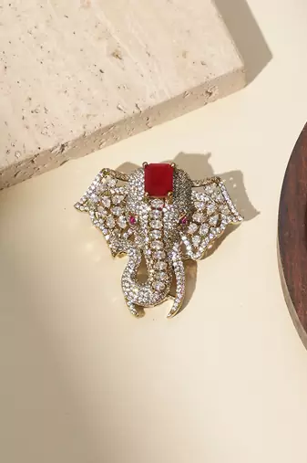 Gold plated red stone american diamond brooch