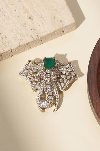 Gold plated green stone american diamond brooch