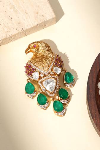 Gold plated green stones royal eagle motif brooch