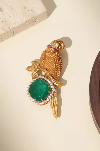 Gold plated green stone parrot motif heritage brooch