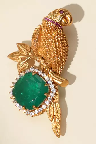 Gold plated green stone parrot motif heritage brooch