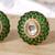 Gold plated green stones stud earrings