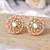Gold plated white diamonds stud earrings